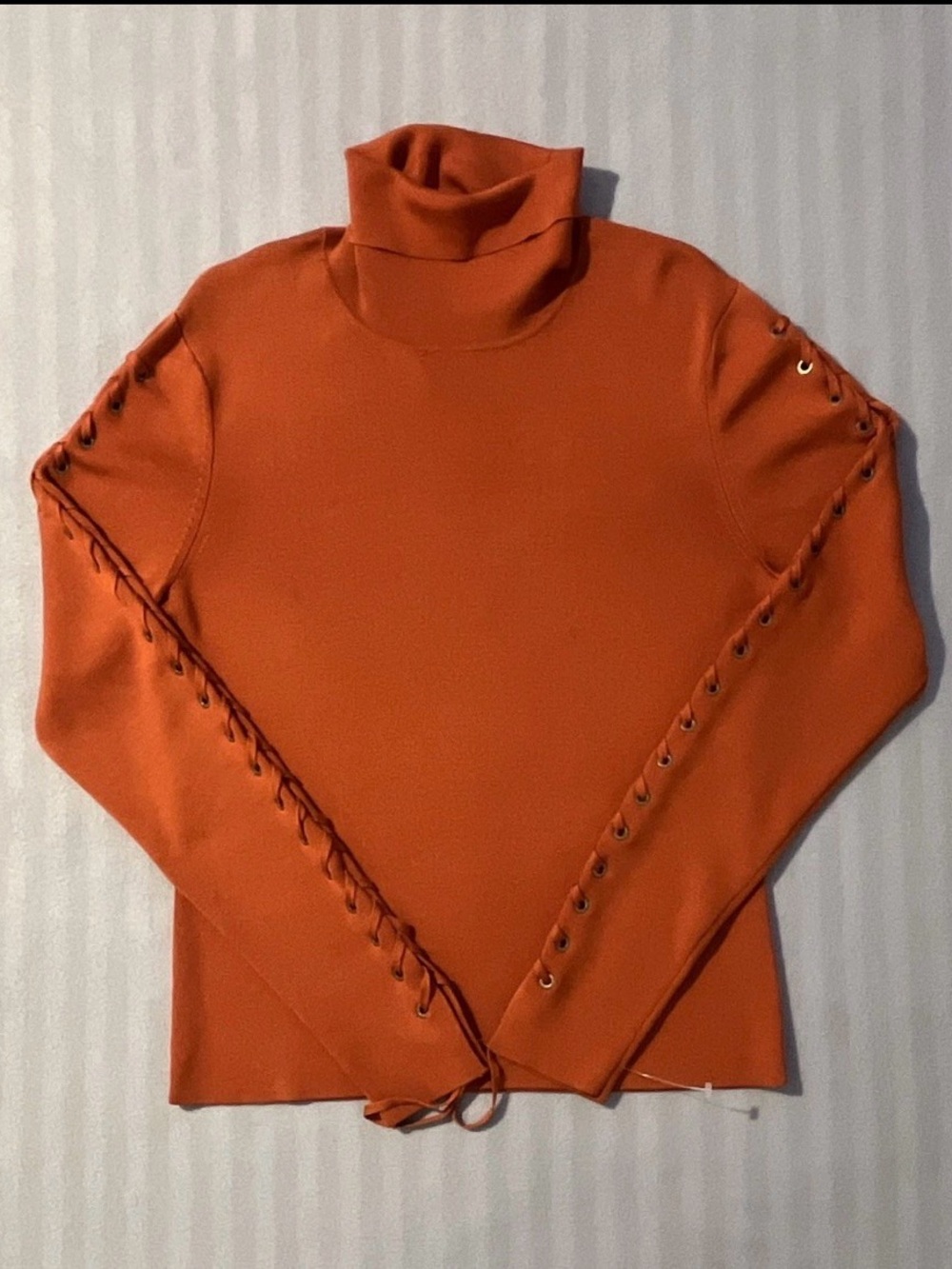 Carlisle Orange Lace-Up Sleeve Turtleneck Sweater